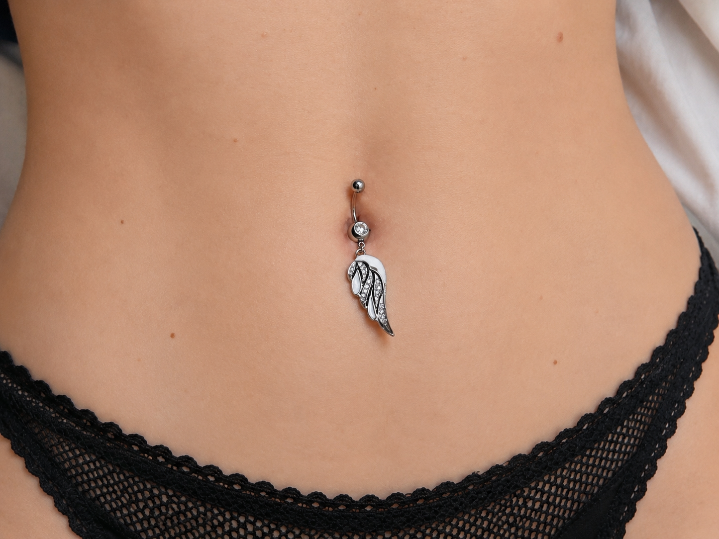 Bauchnabelpiercing Engelsflügel